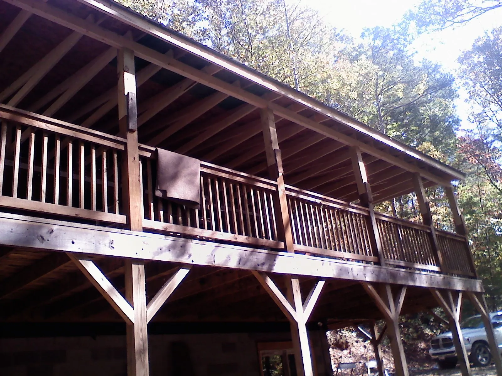 Timber framing under a new elevated porch and deck — Roof Leak Repair in Armuchee by Roofing Brothers